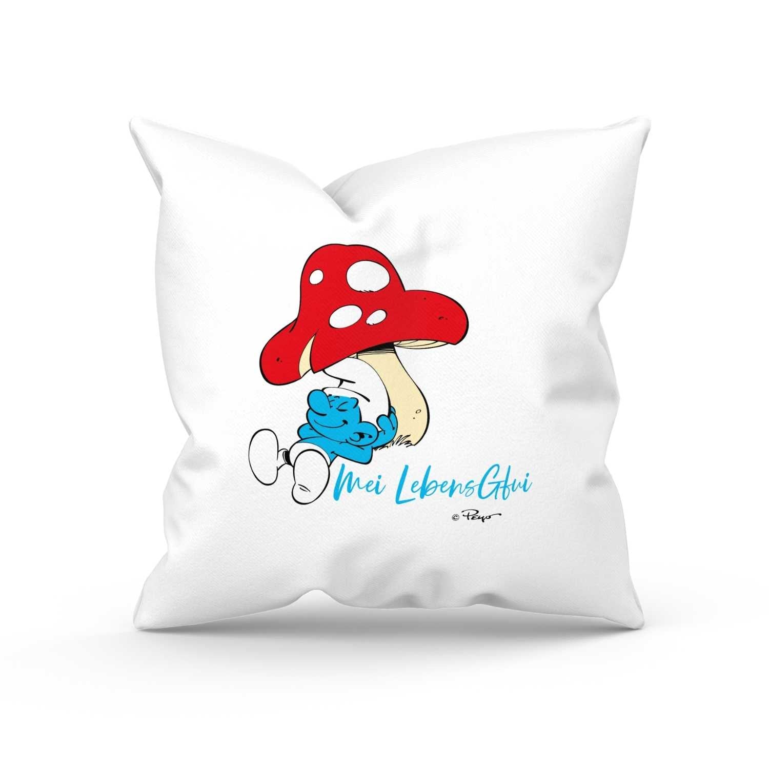 Weißes Schlümpfe Kuschelkissen mit gemütlichem Schlumpf unter einem roten Pilz, Spruch Do legst di nieda!