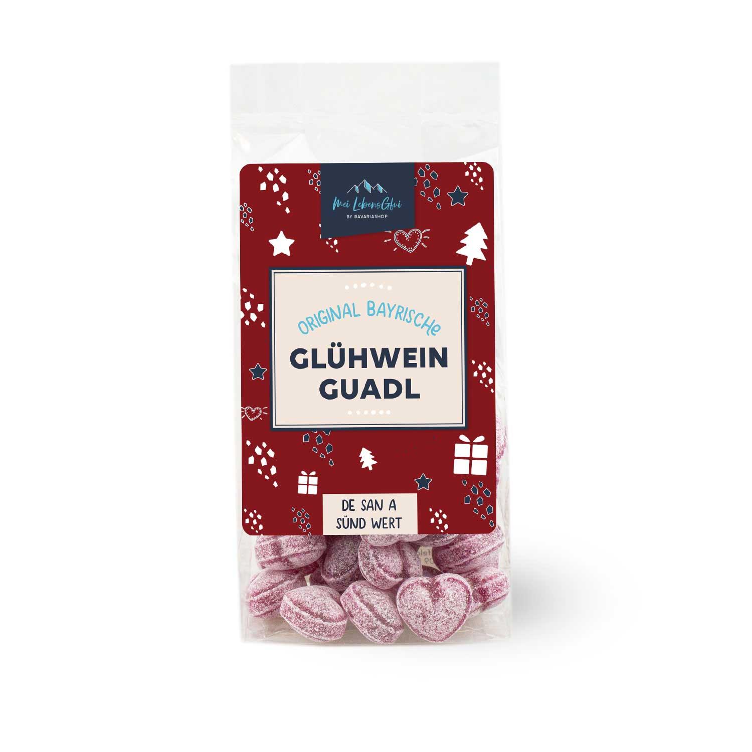 Weihnachtsbox Nikolaussackerl mit herzförmigen Glühwein-Bonbons in roter Verpackung mit Wintermotiven.