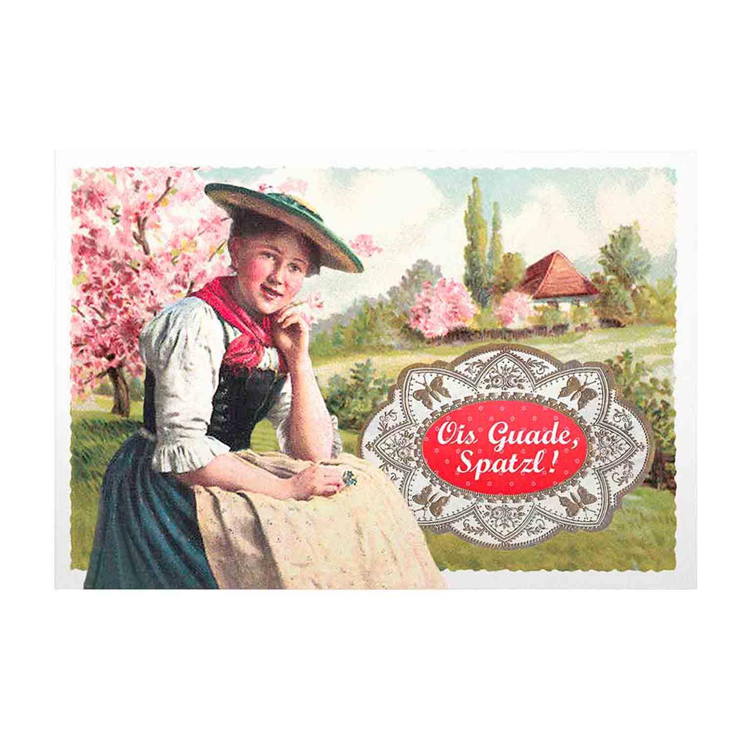 Nostalgisches Postkartenmotiv einer lächelnden jungen Frau in Tracht vor blühenden Bäumen mit bayerischem Gruß