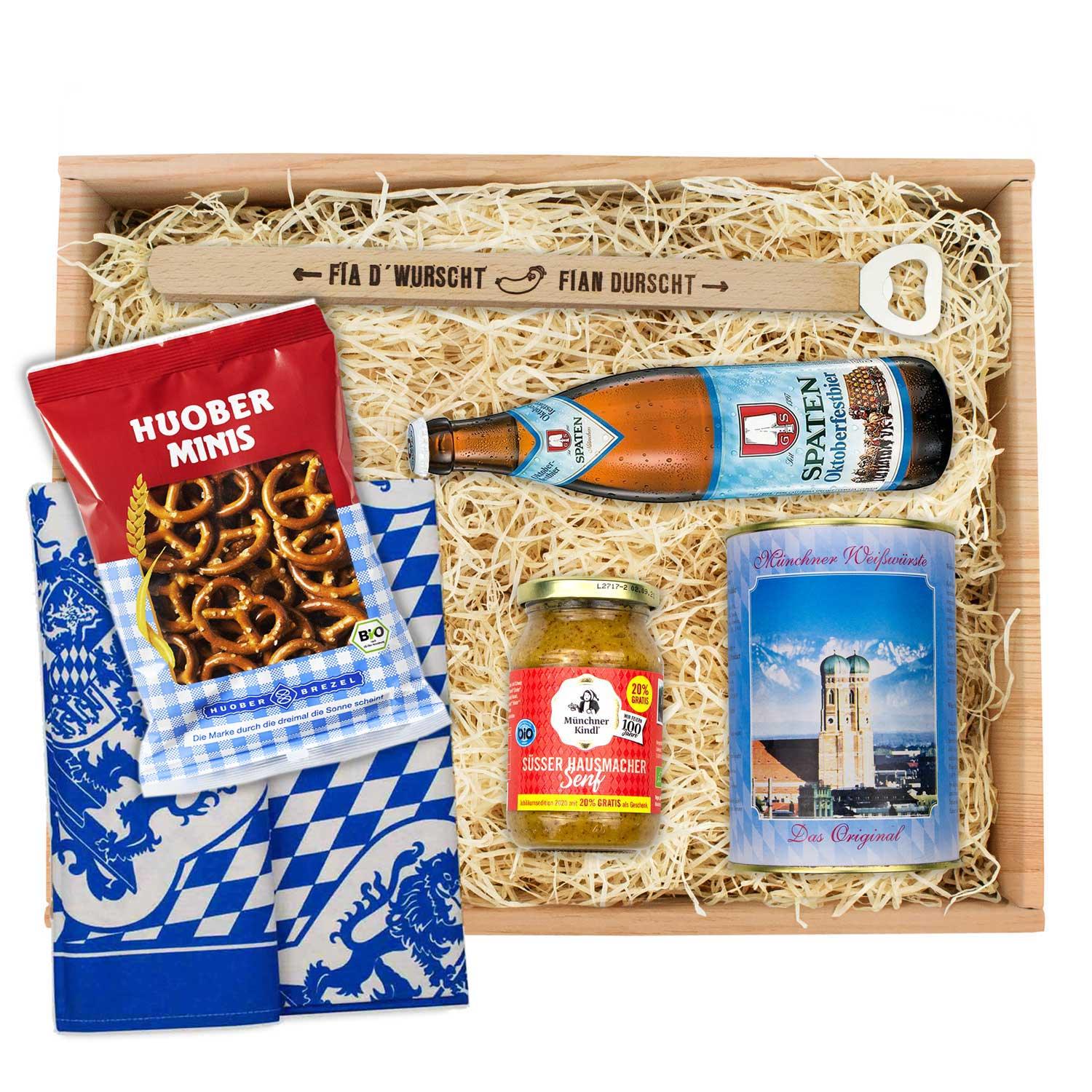 Oktoberfest-Box "Weißwurschtfrühstück" mit Spaten Oktoberfestbier, süßem Senf, Weißwürsten, Brezeln und bayerischem Geschirrtuch in Holzkiste.