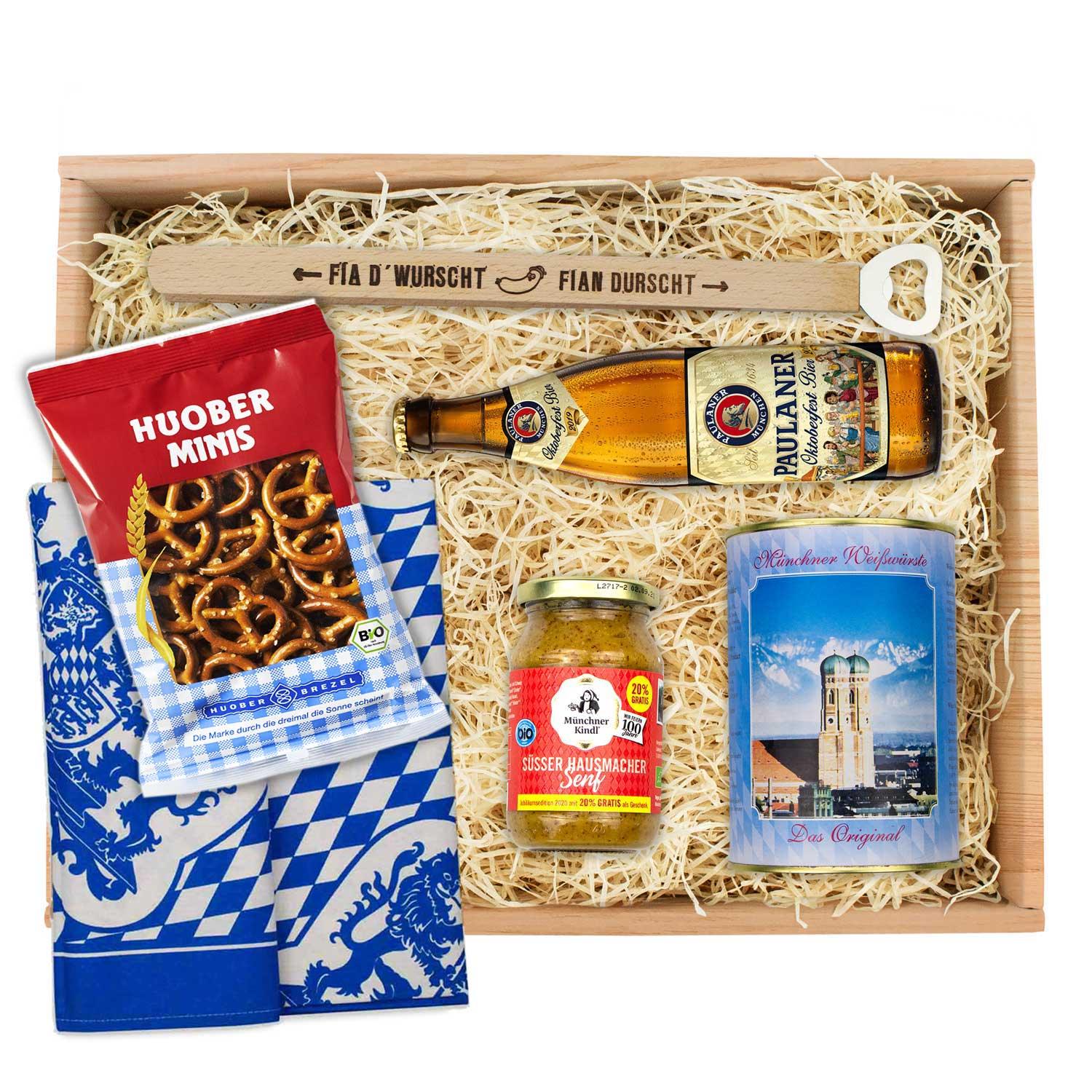 Oktoberfest-Box Weißwurstfrühstück mit Paulaner Bier, Weißwürsten, süßem Senf, Brezel-Minis und bayerischem Geschirrtuch.