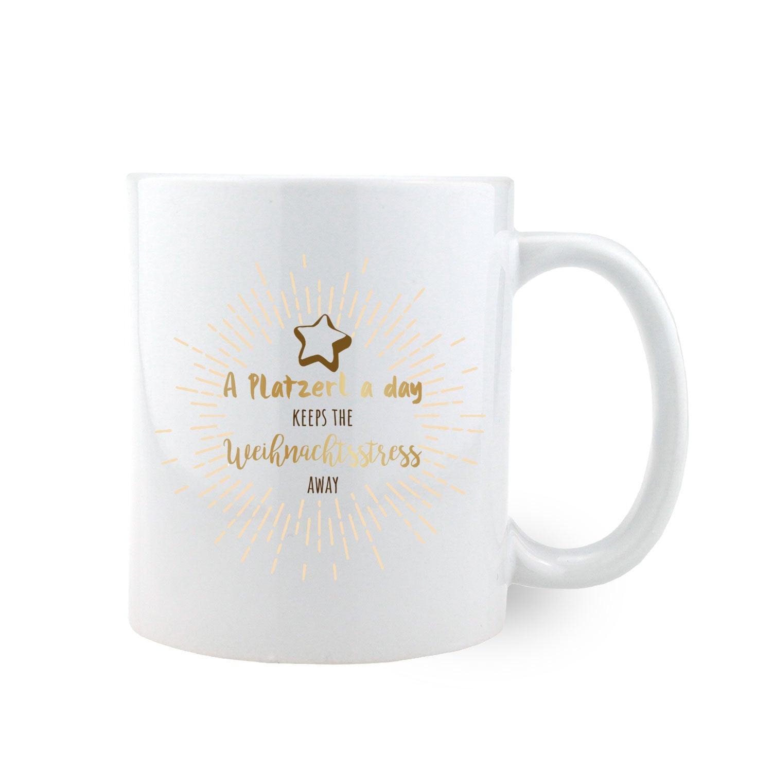 Weiße Keramiktasse mit goldener Schrift Weihnachtsbox Weihnachtsfeier Nikolaus und Sternenmotiv