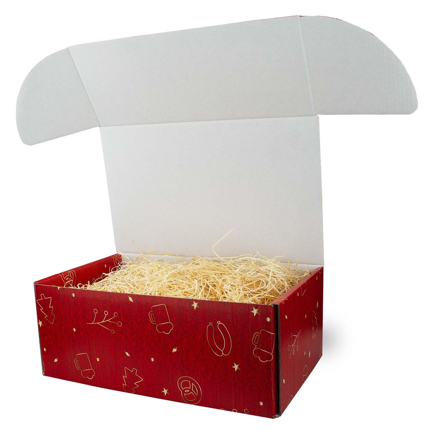 Offene Weihnachtsbox Bescherung in Rot mit goldenen Motiven, gefüllt mit Holzwolle, bereit zum Befüllen