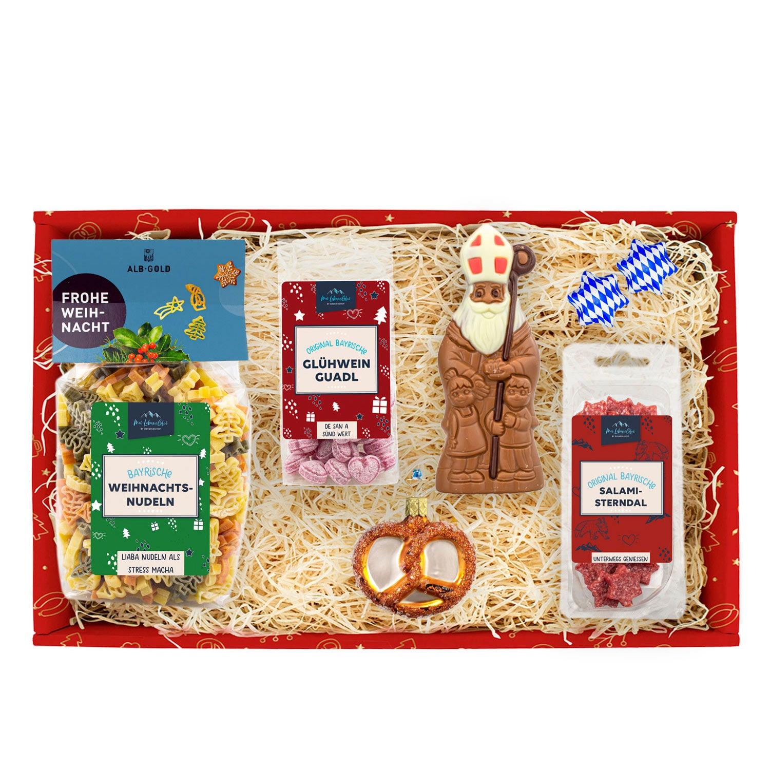 Rot gefüllte Weihnachtsbox Nikolaussackerl mit Schoko-Nikolaus, Weihnachtsnudeln, Salami, Lebkuchen, Glühwein-Guadl.