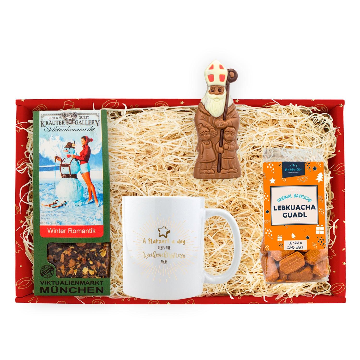 Weihnachtsbox Weihnachtsfeier Nikolaus mit Schokonikolaus, Früchtetee, Lebkuchen und Tasse.