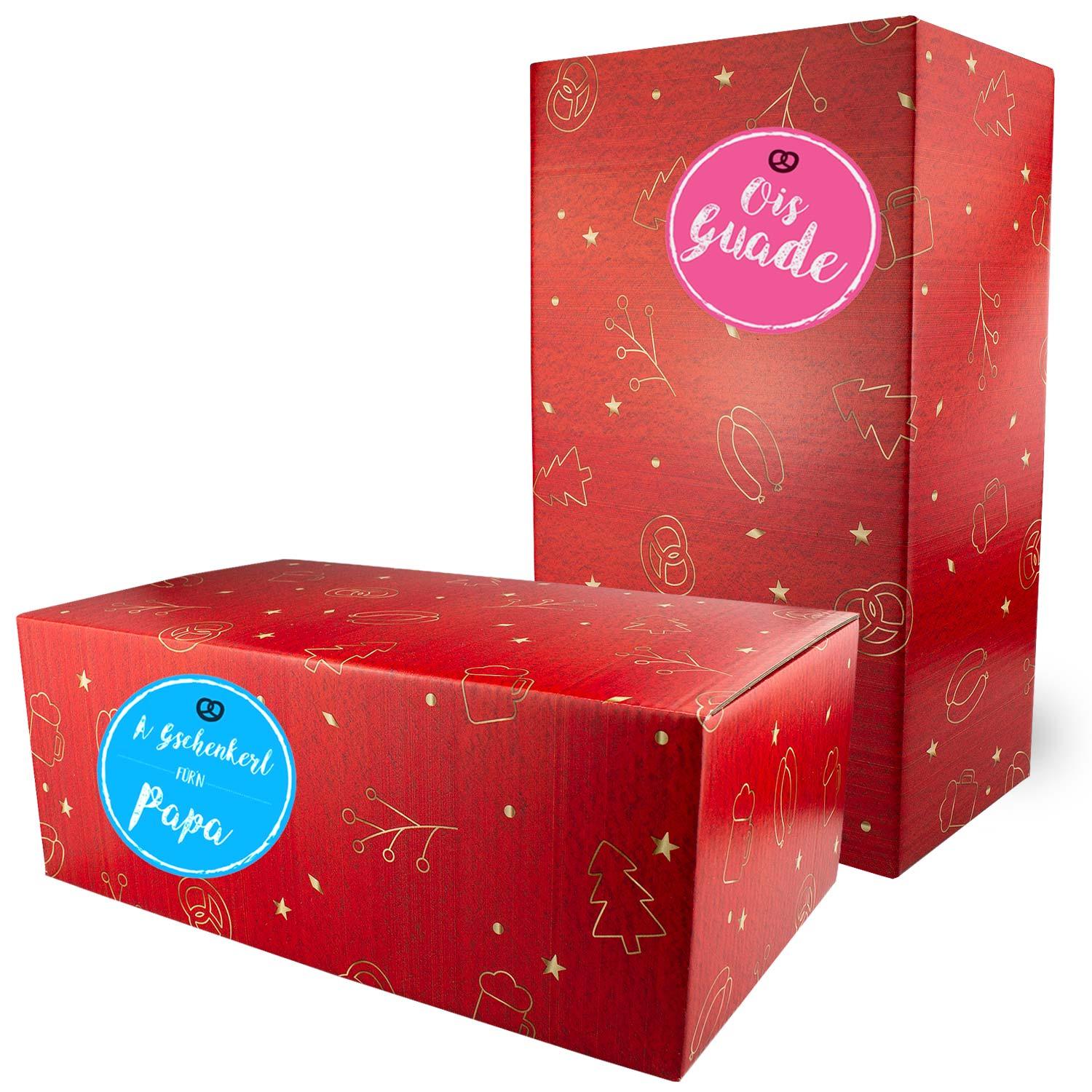 Zwei rote Weihnachtsboxen, "Weihnachtsfeier Nikolaus", mit goldenen bayerischen Motiven und Aufschriften.