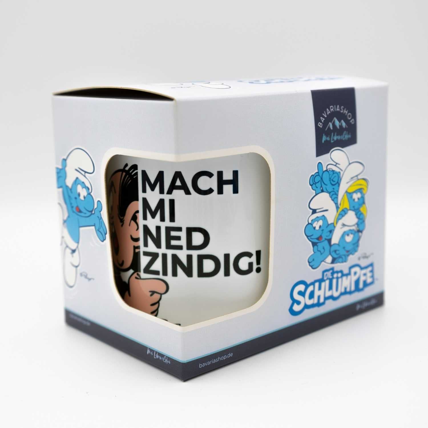 ®Die Schlümpfe Tasse Mach mi ned zindig in Geschenkbox. Weiße Keramiktasse mit lustigem bayerischem Spruch.