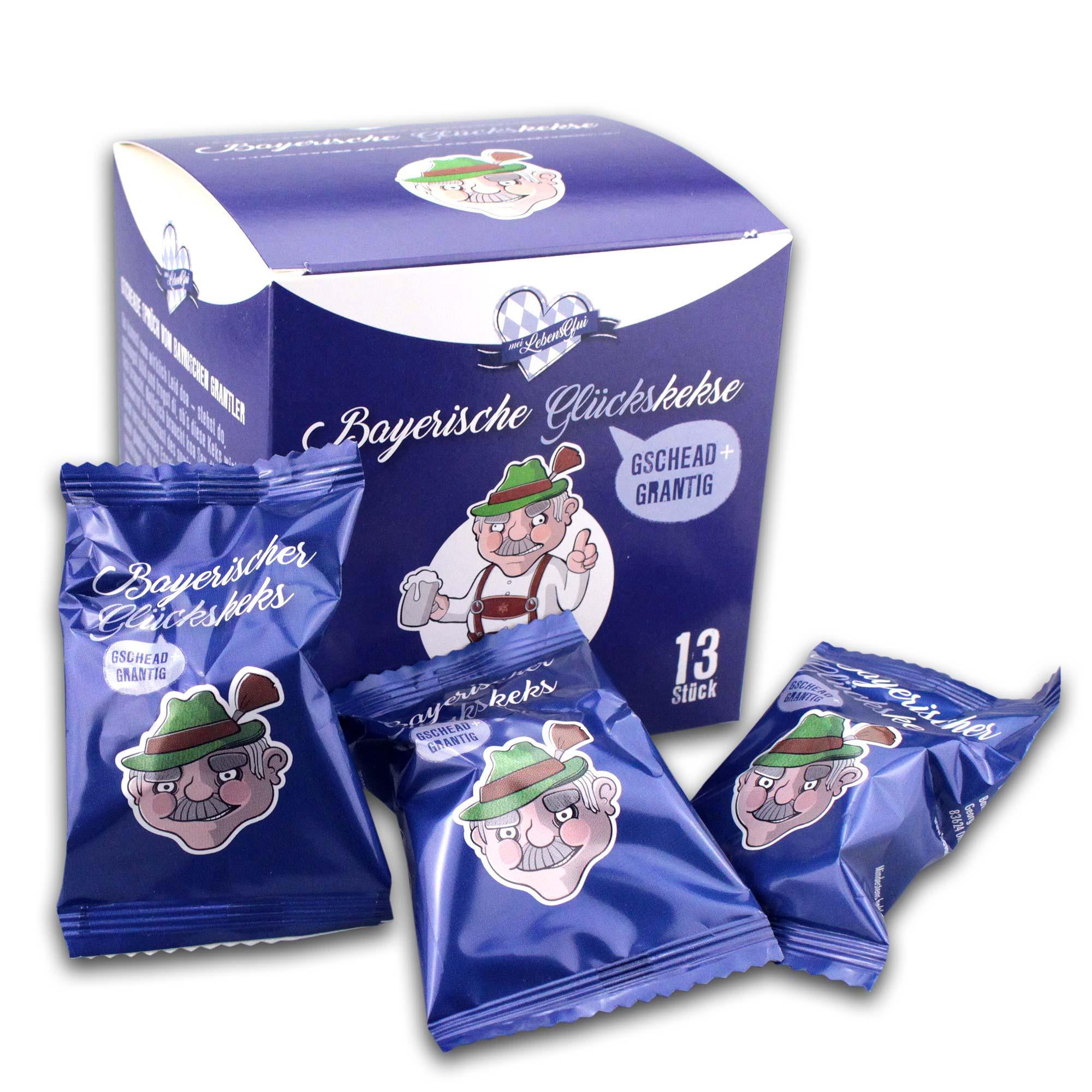 Bayerische Glückskekse "Gschead Grantig" in blauer Verpackung mit einem Seppl-Motiv und 13 Stück Inhalt.