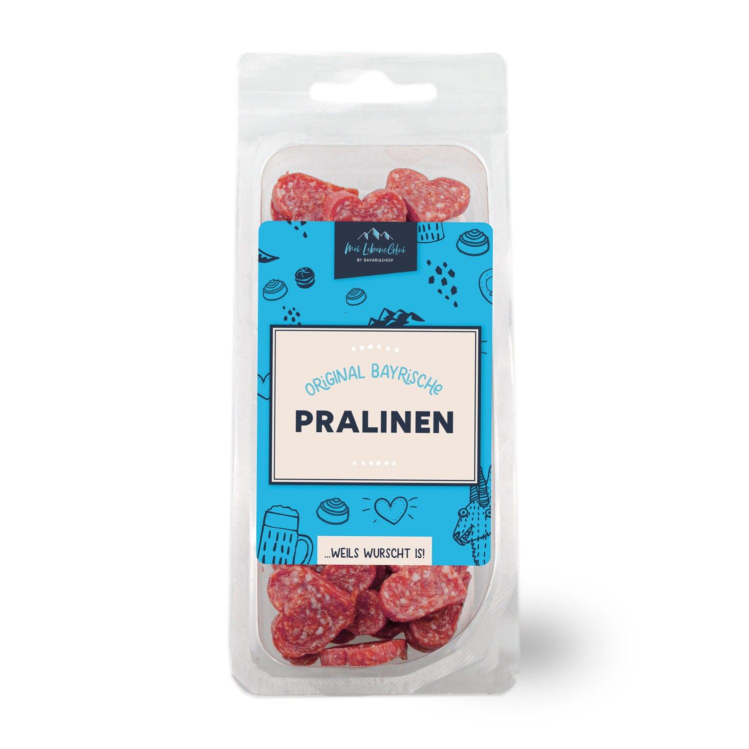 Geschenkbox "Mei Brotzeit" mit herzförmigen Salami-Scheiben, bayerische Pralinen aus Wurst in Klarsichtverpackung.