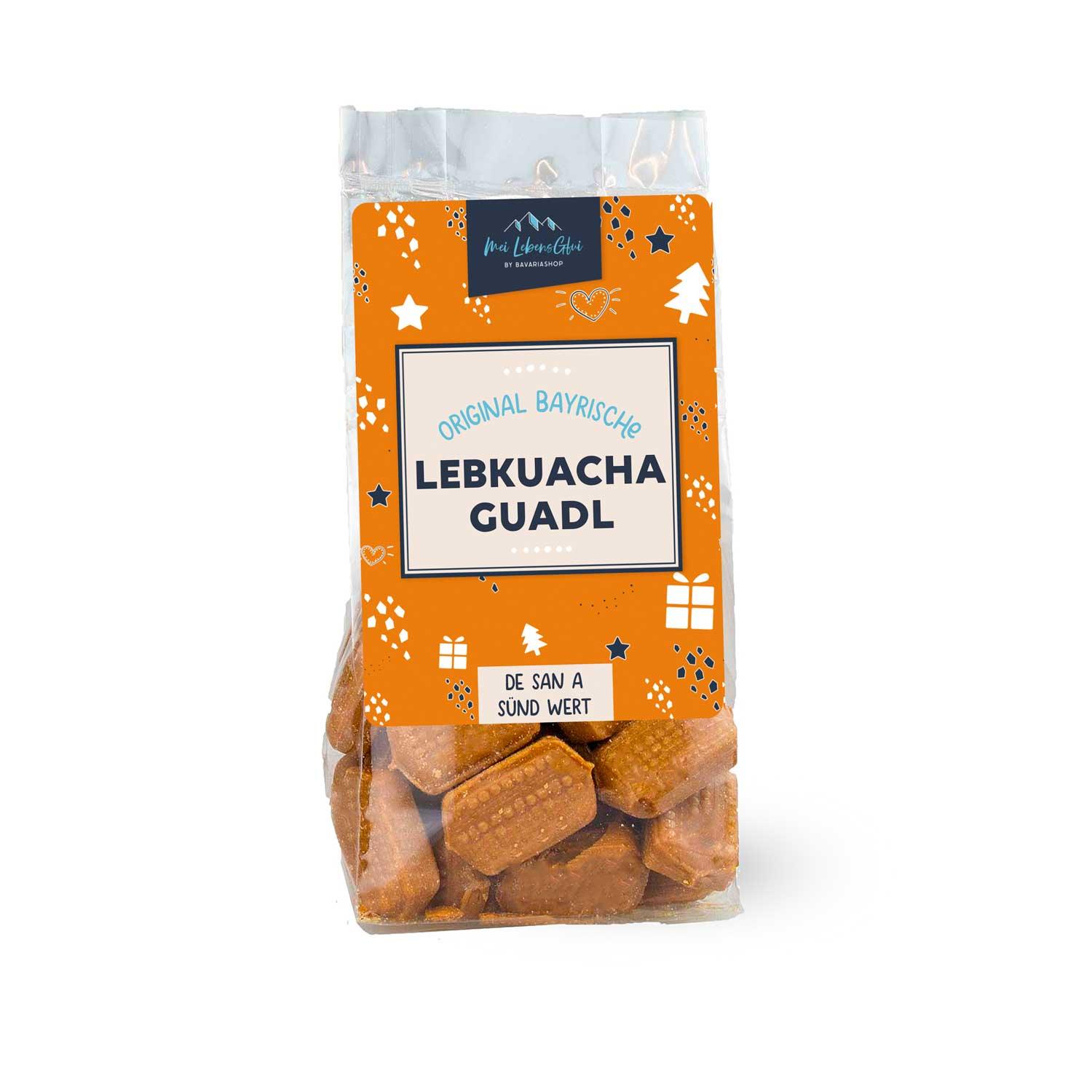 Weihnachtsbox Vorfreude mit bayerischen Lebkuchen-Guadln in transparenter Verpackung mit weihnachtlichem Design.