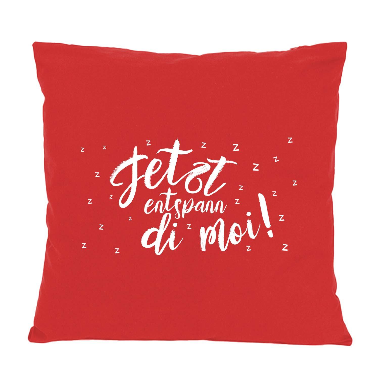 Rotes Kissen Entspann di moi mit weißem Schriftzug und kleinen "Z"-Symbolen für Schlaf und Entspannung.