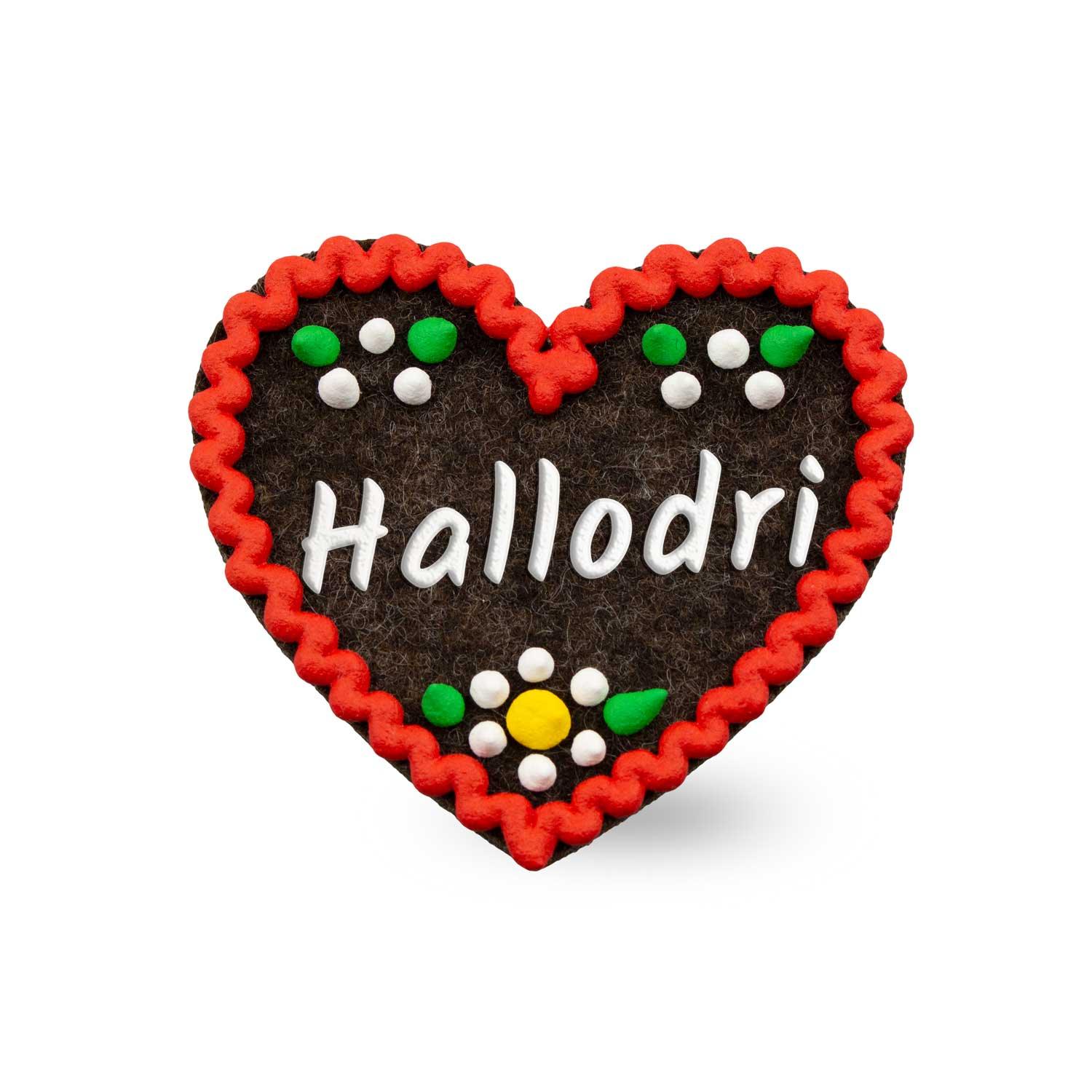 Filzherz-Anstecker Hallodri in Braun mit rotem Zackenrand, "Hallodri"-Schriftzug und bunten Verzierungen