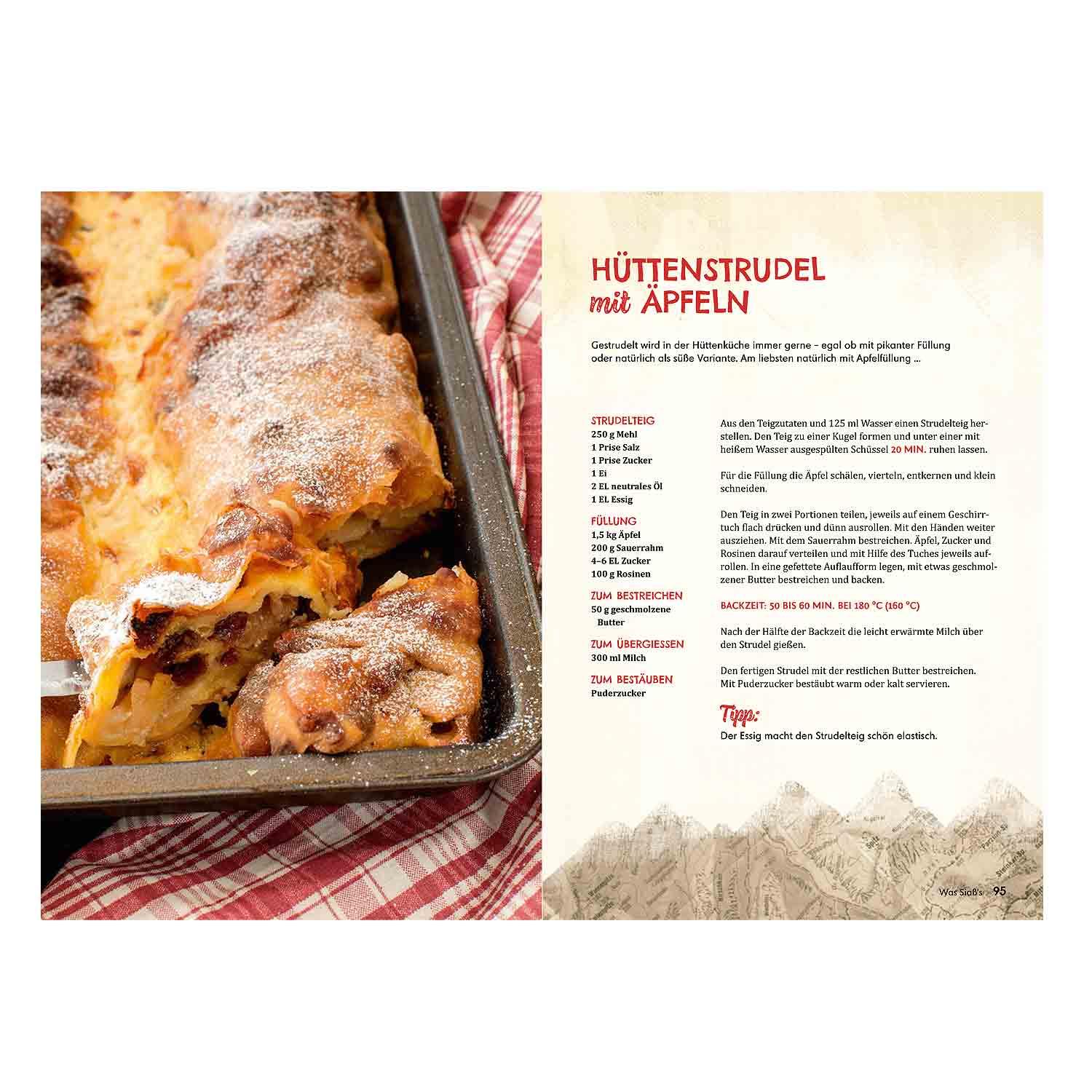 Hüttenküche für Dahoam: Frisch gebackener Apfelstrudel mit Puderzucker in Backform, bereit zum Servieren.