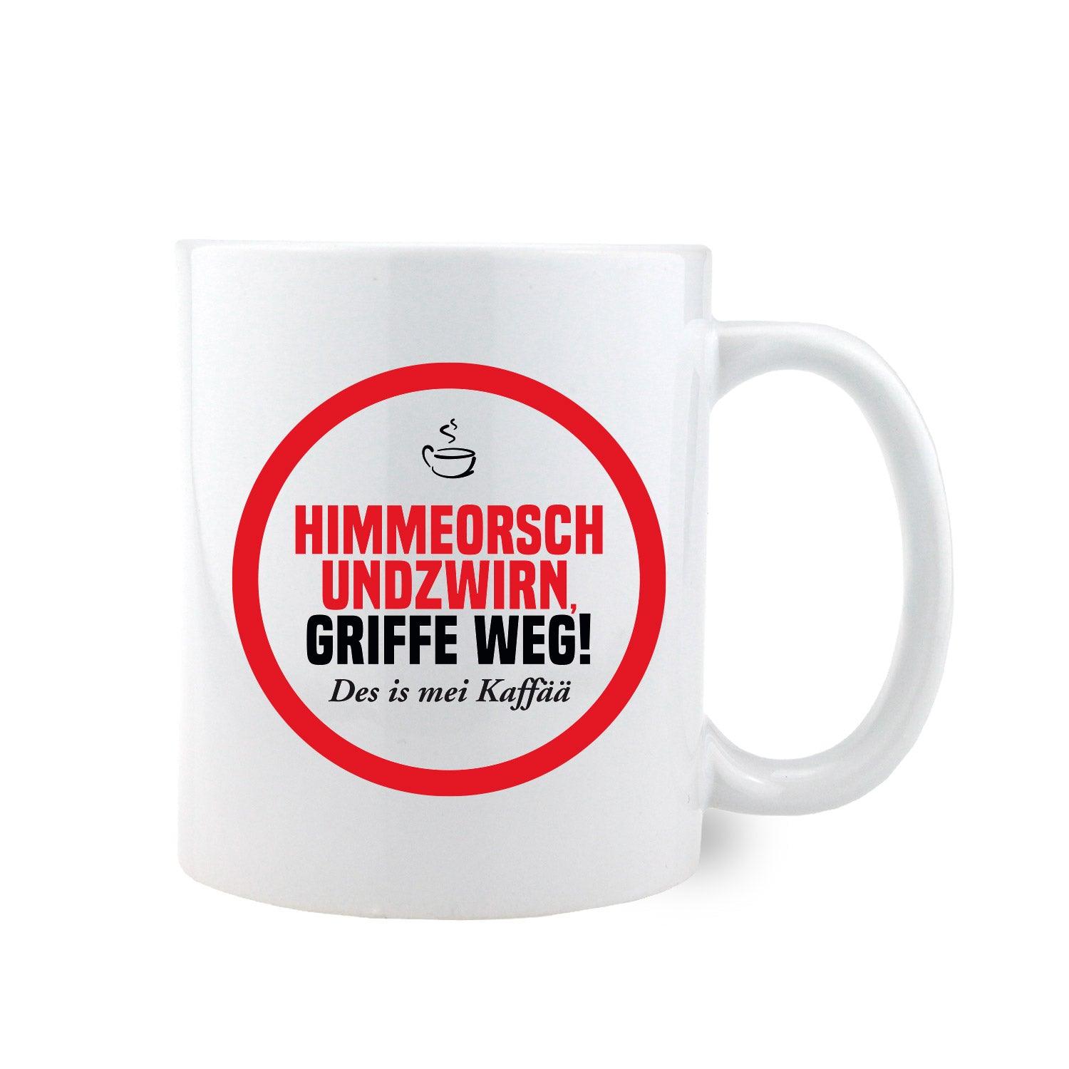 Weißes Kaffee-Haferl "Himmeorschundzwirn" mit rotem Aufdruck und bayerischem Spruch für fröhliche Kaffeepausen.