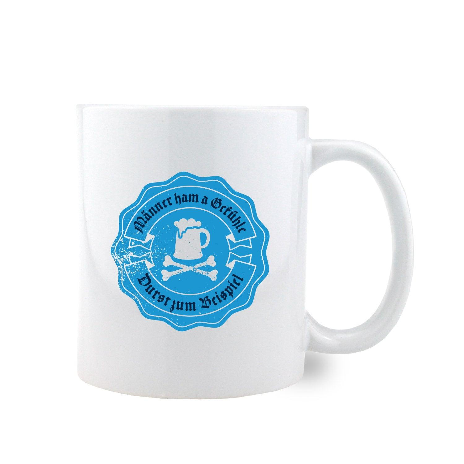 Weißes Kaffee Haferl "Männer ham a Gefühle..." mit blauem bayerischen Spruch und Bierkrug-Symbol.