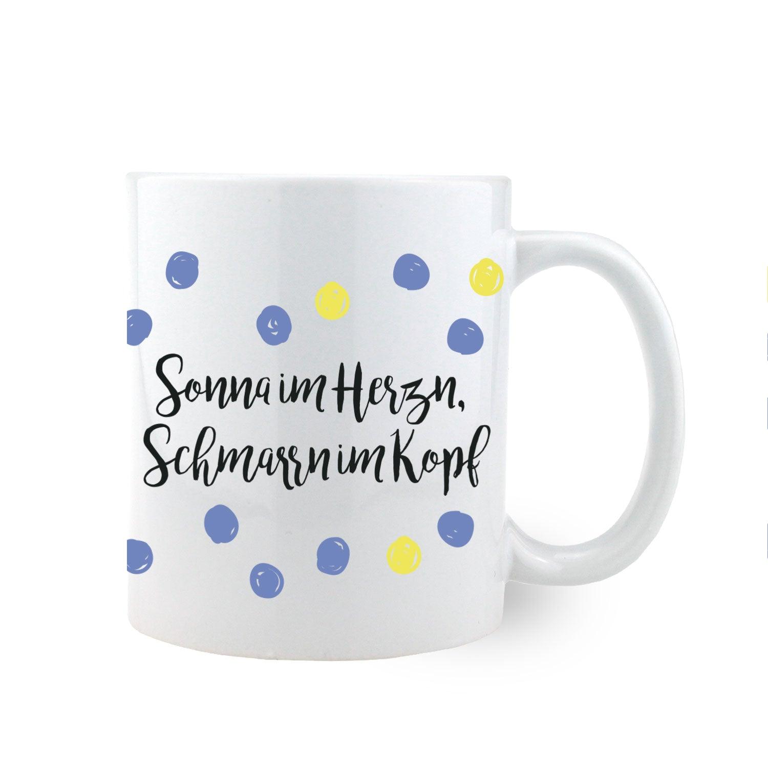 Kaffee Haferl Sonna im Herzn mit Spruch und blauen/gelben Punkten, ideal für Morgenkaffee.