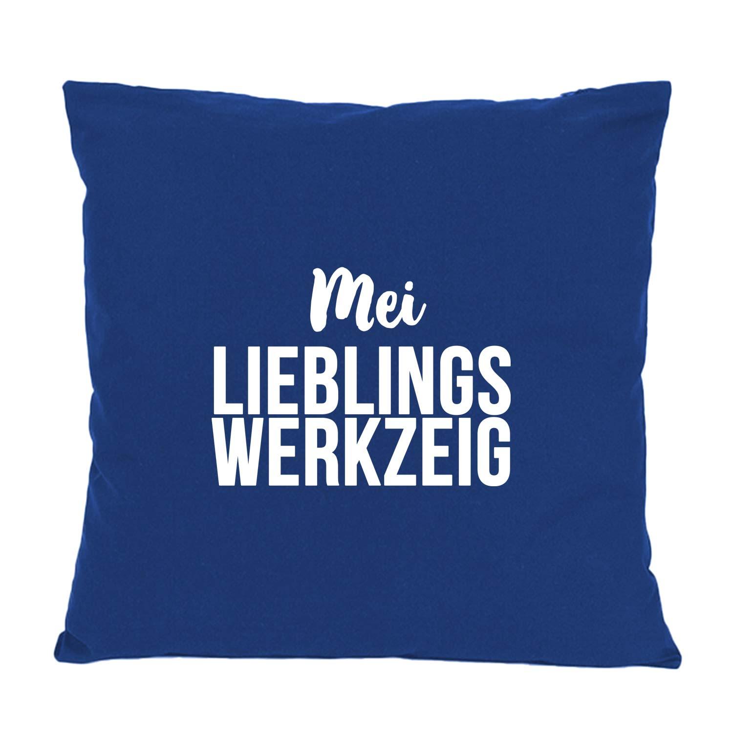 Dunkelblaues Kissen "Mei Lieblingswerkzeig" mit weißem Schriftzug, rechteckige Form, weicher Stoff.