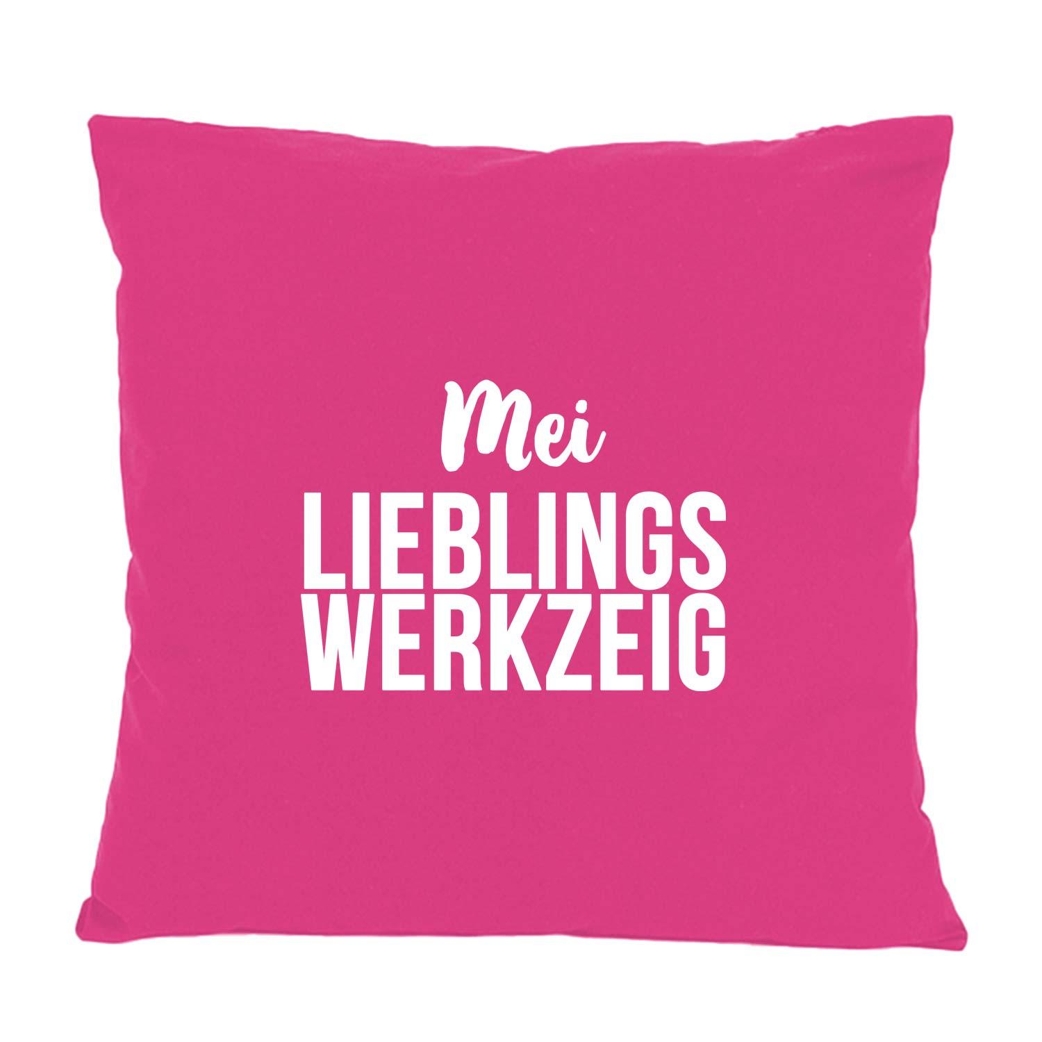 Rosa Kissen Mei Lieblingswerkzeig mit weißem Schriftzug, quadratisch und weich, für Dekoration oder als Geschenk.