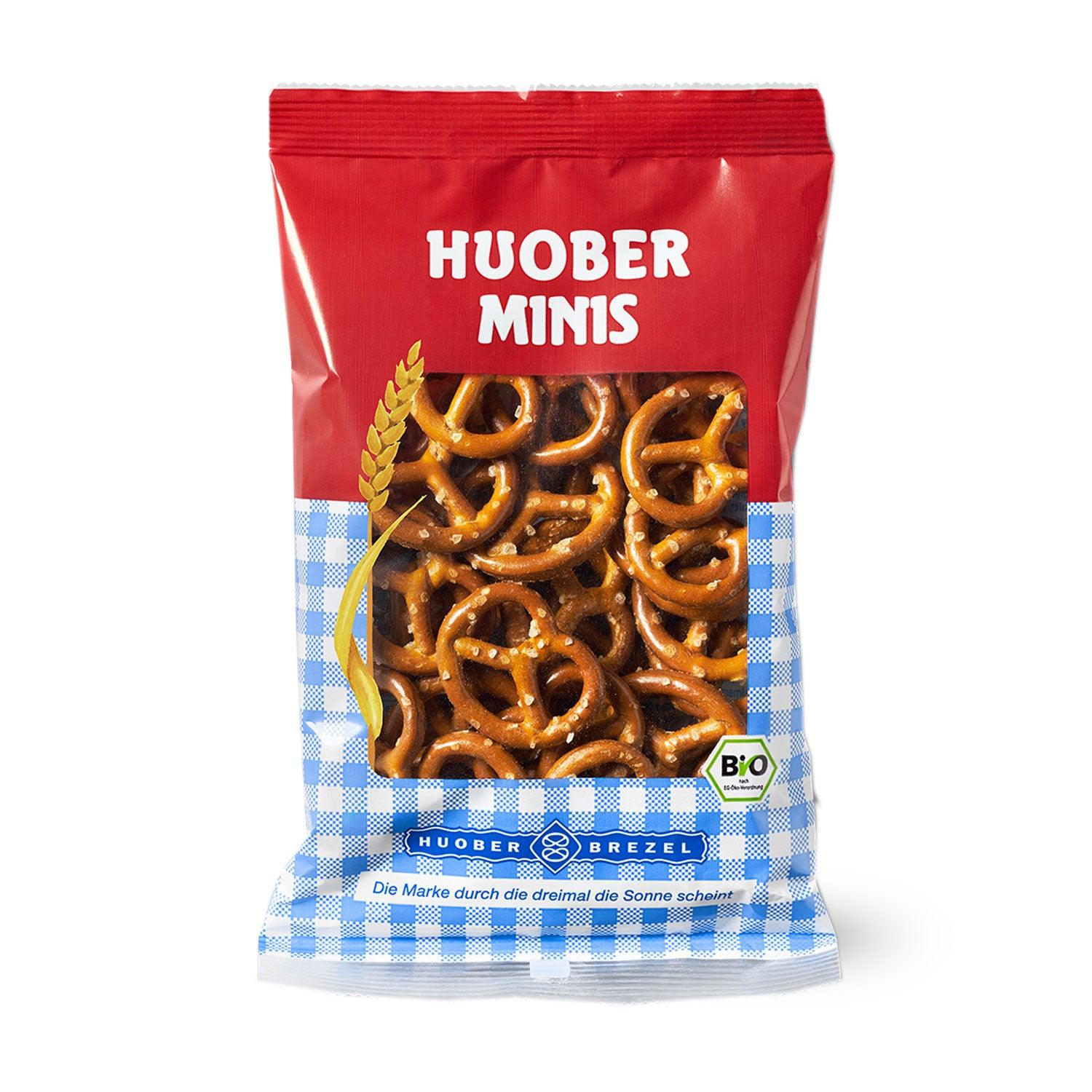 Roter Beutel Mini-Salz-Brezn mit Sichtfenster, bayerischem Karomuster und Bio-Siegel.