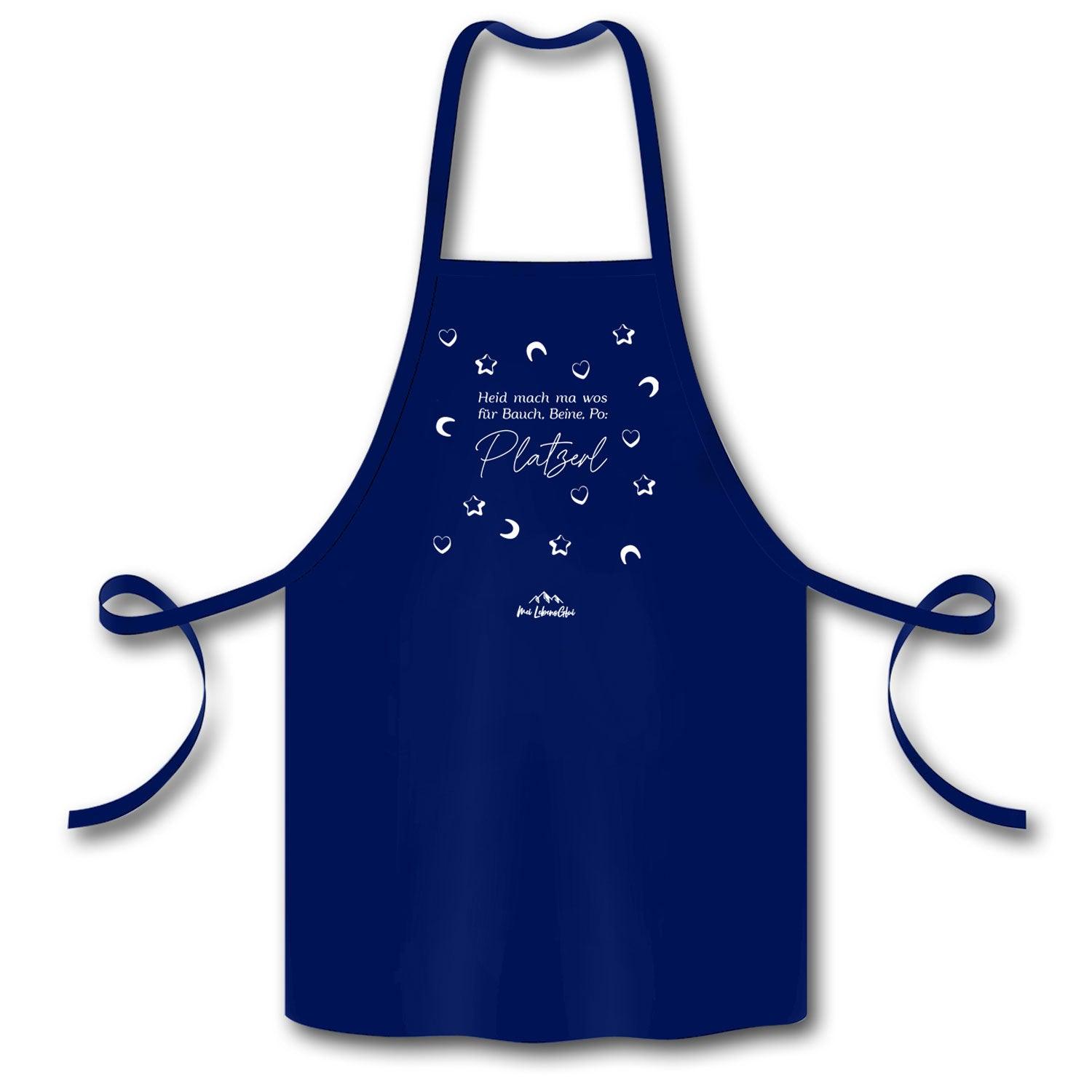 Dunkelblaue Schürze Heid mach ma... Platzerl mit weißem Schriftzug und Sternenmotiven zum Kochen.